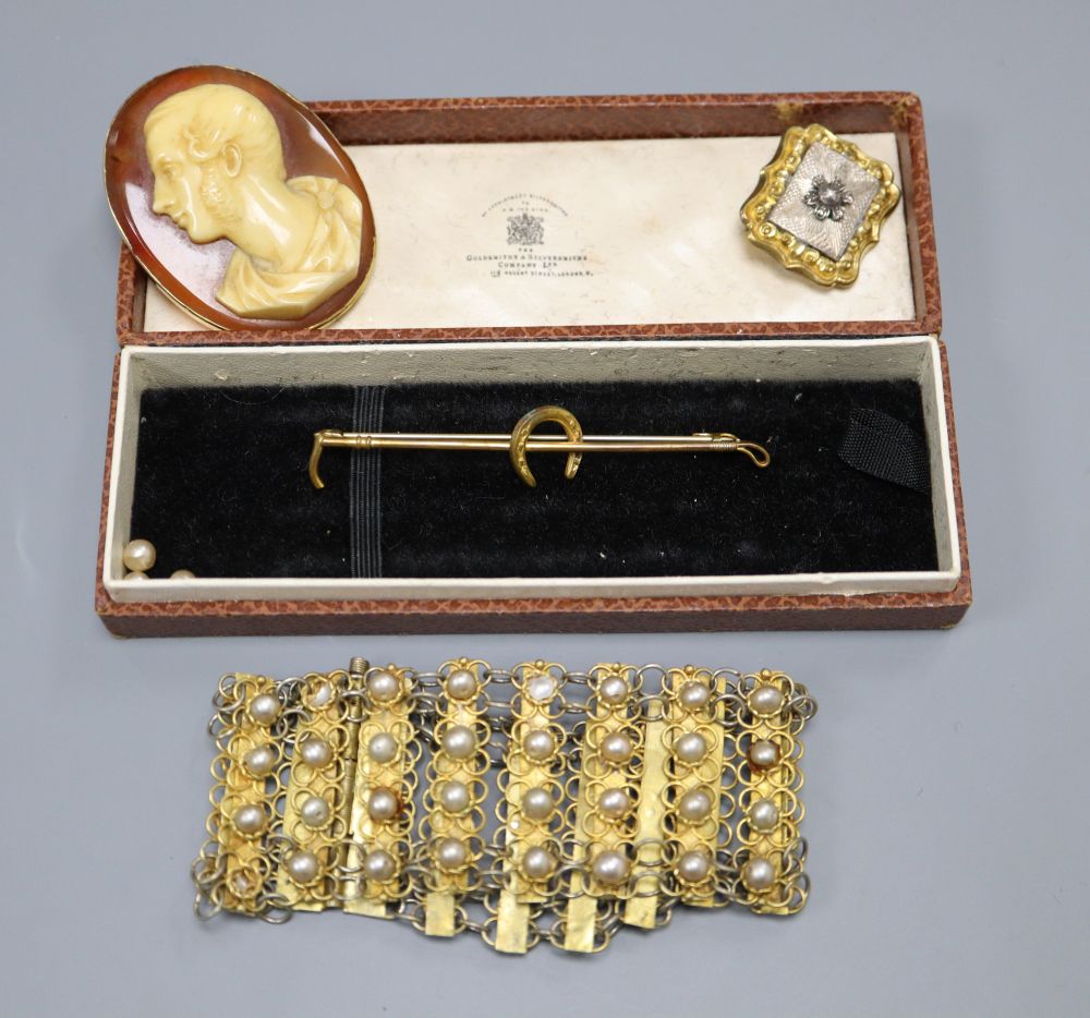 A 19th century composition cameo portrait on a carnelian plaque, in gilt metal mount and three other items,